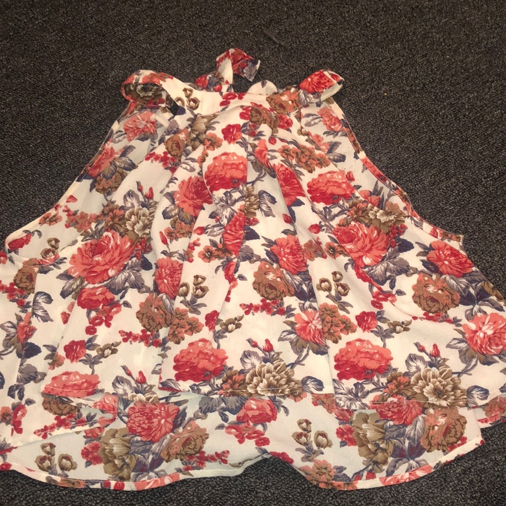 A flower blouse kinda a crop top.